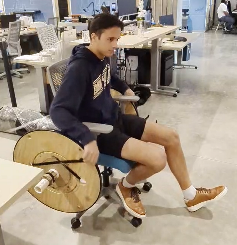 Cole Montrose, ERAU programmer, tests out the wheelchair controller