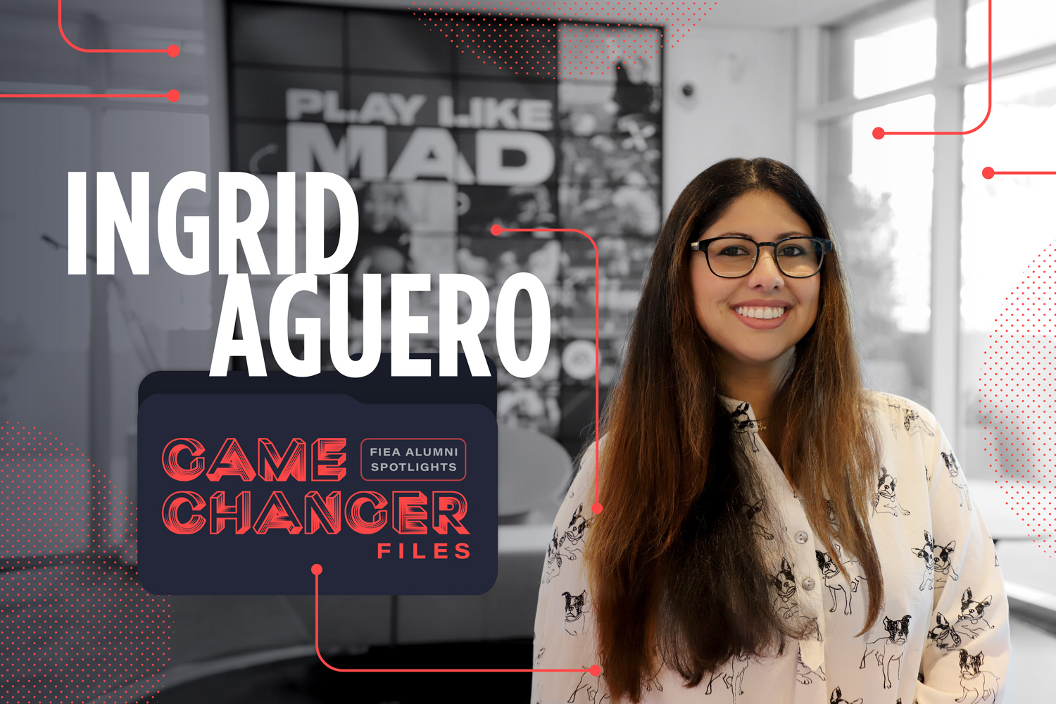 Ingrid Aguero, FIEA alumna from Cohort 4, smiles in the lobby of the EA Orlando location in Creative Village, just a block away from Florida Interactive Entertainment Academy