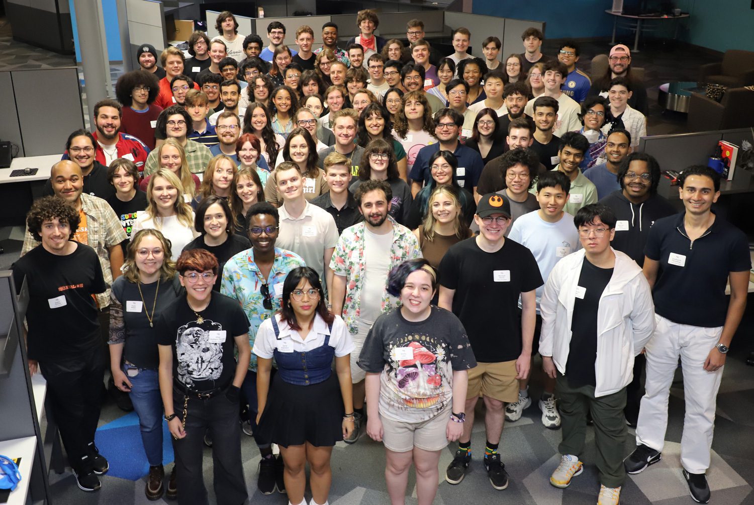 Group photo of FIEA's Cohort 22 in the student cohort space