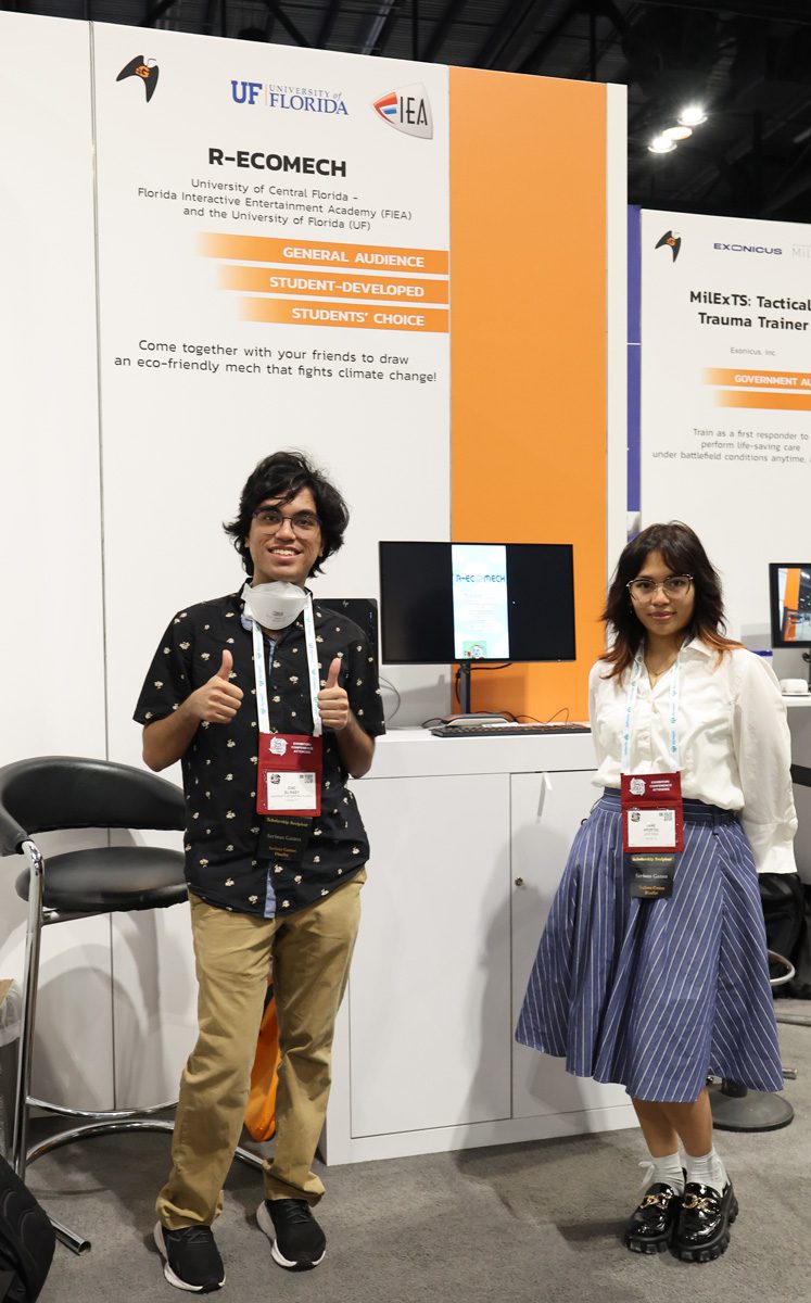 Ziad El-Rady and Jane Apostol, Cohort 22 students showcase their game at the Serious Games booth