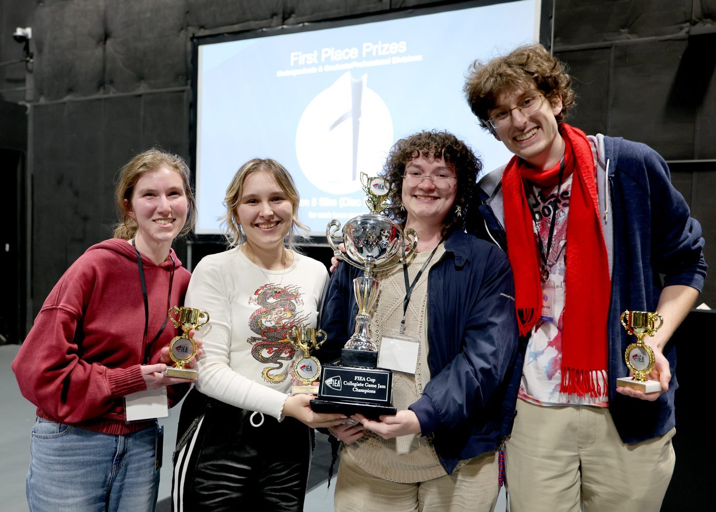 Group photo of two team members smiling