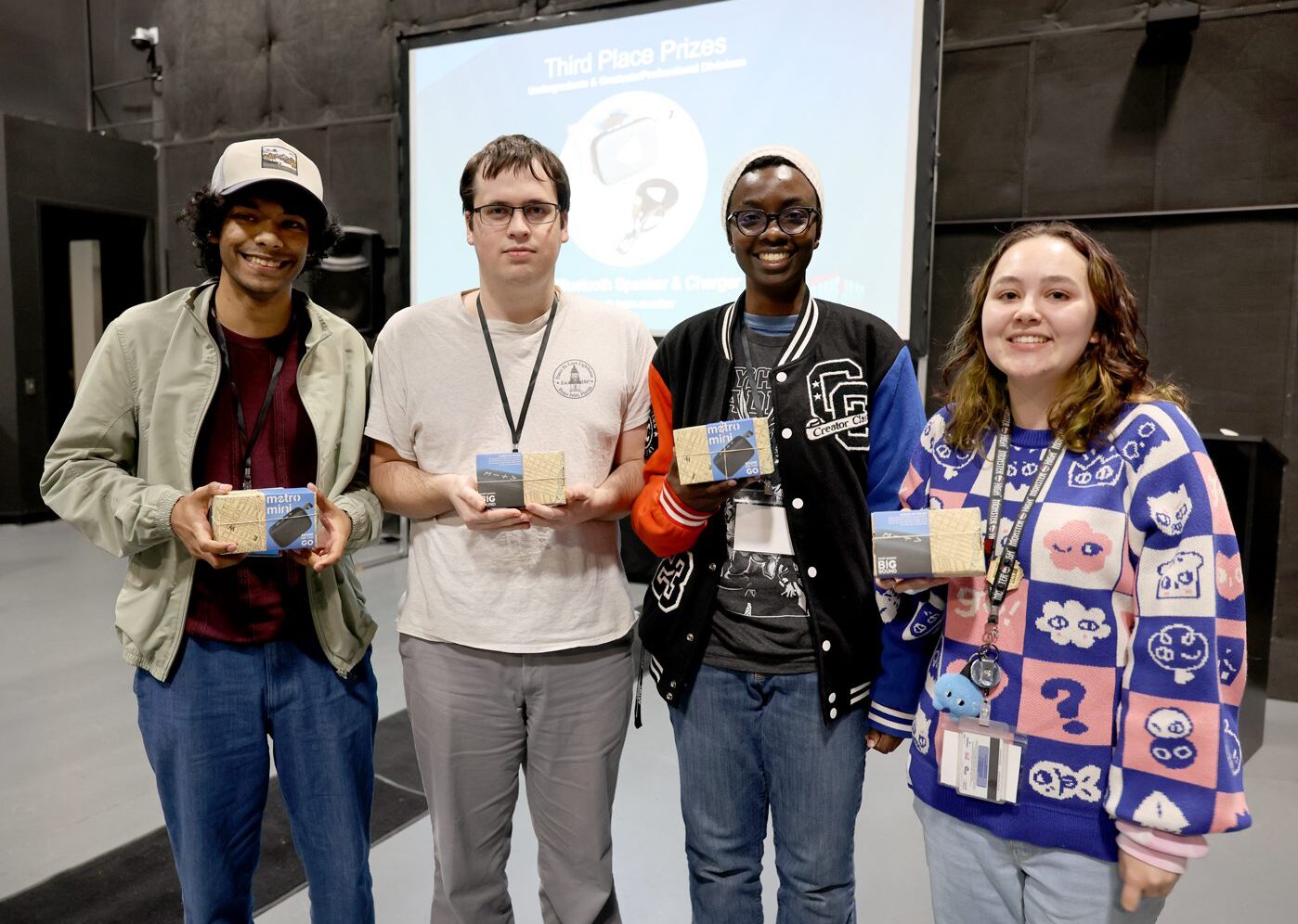 Group photo of team members smiling